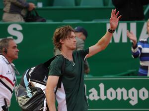 Russia's Andrey Rublev leaves the court after losing his Monte-Carlo ATP Masters Series tournament tennis match against Italy's Jannik Sinner in Monaco on April 14, 2022. (Photo by Valery HACHE / AFP)