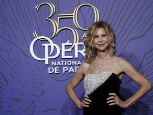 US actress Meg Ryan poses for photographers upon arrival for a gala on the occasion of the 350th anniversary of the Opera de Paris in Paris on May 8, 2019. The Opera of Paris on May 8 celebrates 350 years since it foundation in 1669. / AFP / FRANCOIS GUILLOT