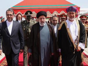 President Ebrahim Raisi (center) with Sultan Qaboos 