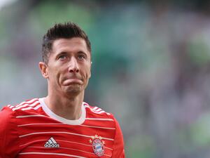 Bayern Munich's Polish forward Robert Lewandowski reacts after the German first division Bundesliga football match VfL Wolfsburg v Bayern Munich in Wolfsburg, northern Germany, on May 14, 2022. (Photo by Ronny Hartmann / AFP) 