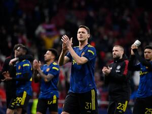 Manchester United's Serbian midfielder Nemanja Matic and teammates react at the end of the UEFA Champions League football match between Atletico de Madrid and Manchester United at the Wanda Metropolitano stadium in Madrid on February 23, 2022. (Photo by OSCAR DEL POZO / AFP)
