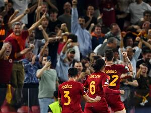 Roma's Italian midfielder Nicolo Zaniolo (R) celebrates with teammates after scoring the team's first goal during the UEFA Europa Conference League final football match between AS Roma and Feyenoord at the Air Albania Stadium in Tirana on May 25, 2022. (Photo by OZAN KOSE / AFP)