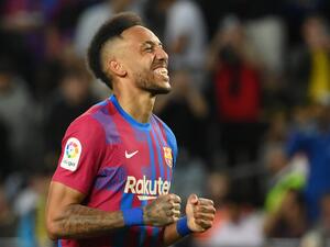 Barcelona's Gabonese midfielder Pierre-Emerick Aubameyang celebrates after scoring a goal during the Spanish league football match between FC Barcelona and RC Celta de Vigo at the Camp Nou stadium in Barcelona on May 10, 2022. (Photo by LLUIS GENE / AFP)