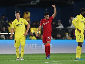 Liverpool's Colombian midfielder Luis Diaz celebrates scoring his team's second goal during the UEFA Champions League semi final second leg football match between Liverpool and Villarreal CF at La Ceramica stadium in Vila-real on May 3, 2022. (Photo by Paul ELLIS / AFP)
