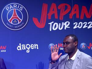 Patrick M’Boma, a former player of the Cameroon national football team and France’s Paris Saint Germain, attends a press event in Tokyo on May 26, 2022, to announce the PSG 2022 Japan tour. (Photo by Behrouz MEHRI / AFP)