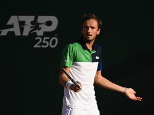 Russia's Daniil Medvedev reacts after losing a point against France's Richard Gasquet during their ATP 250 Geneva Open tennis match in Geneva on May 17, 2022. (Photo by Fabrice COFFRINI / AFP)
