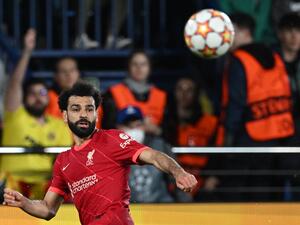 Liverpool's Egyptian midfielder Mohamed Salah eyes the ball during the UEFA Champions League semi final second leg football match between Liverpool and Villarreal CF at La Ceramica stadium in Vila-real on May 3, 2022. (Photo by Paul ELLIS / AFP)
