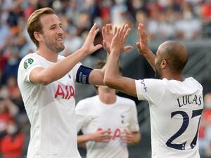 Tottenham's Brazilian forward Lucas (R) celebrates with Tottenham's English forward Harry Kane (L) after scoring during the UEFA Europa Conference League Group G football match between Stade Rennais Football Club (Rennes) and Tottenham at The Roazhon Park Stadium in Rennes, north-western France on September 16, 2021. (Photo by JEAN-FRANCOIS MONIER / AFP)