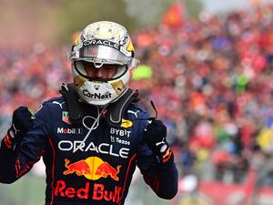Red Bull Racing's Dutch driver Max Verstappen celebrates victory after the Emilia Romagna Formula One Grand Prix at the Autodromo Internazionale Enzo e Dino Ferrari race track in Imola, Italy, on April 24, 2022. (Photo by ANDREJ ISAKOVIC / AFP)