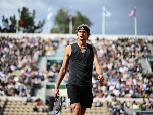 Germany's Alexander Zverev reacts as he plays against Spain's Bernabe Zapata Miralles during their men's singles match on day eight of the Roland-Garros Open tennis tournament at the Court Suzanne-Lenglen in Paris on May 29, 2022. (Photo by Christophe ARCHAMBAULT / AFP)