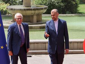 Josep Borrell (L) Hossein Amirabdollahian