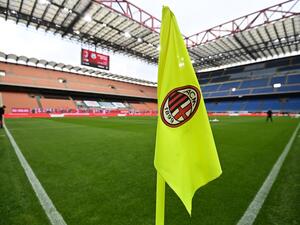 he logo of AC Milan is pictured on a corner flag prior to the Italian Serie A football match AC Milan vs Sassuolo at the San Siro stadium in Milan. AC Milan announced that its current owners, investment fund Elliot Advisors, have agreed to sell the newly-crowned Italian A champions to rival fund RedBird for 1.2 billion euros ($1.3 billion). (Photo by MIGUEL MEDINA / AFP) 