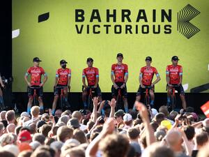 Bahrain Victorious team riders attend the cycling teams' presentation two days ahead of the first stage of the 109th edition of the Tour de France cycling race, in Copenhagen, in Denmark, on June 29, 2022. (Photo by Thomas SAMSON / AFP)