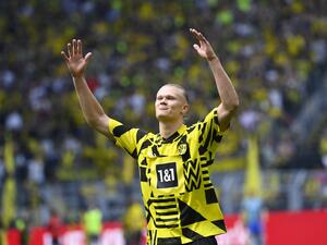 Dortmund's Norwegian forward Erling Braut Haaland reacts after his farewell before the German first division Bundesliga football match Borussia Dortmund v Hertha BSC Berlin in Dortmund, western Germany, on May 14, 2022. (Photo by INA FASSBENDER / AFP) 