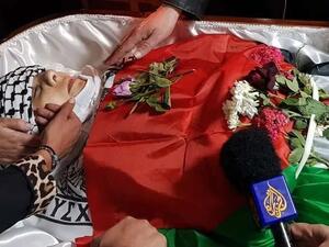 بين راشيل كوري وشيرين أبو عاقلة