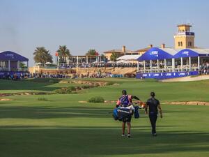 Collin Morikawa walks down the 18th during his 2021 DP World Tour Championship victory resize (Credit: Supplied)