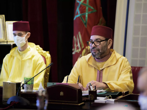Morocco's King (R) and his son 
