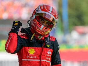 Ferrari's Monegasque driver Charles Leclerc celebrates after winning the Formula One Austrian Grand Prix on the Red Bull Ring race track in Spielberg, Austria, on July 10, 2022. (Photo by Jure Makovec / AFP)
