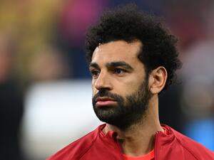 Liverpool's Egyptian midfielder Mohamed Salah reacts during the UEFA Champions League final football match between Liverpool and Real Madrid at the Stade de France in Saint-Denis, north of Paris, on May 28, 2022. (Photo by Paul ELLIS / AFP)
