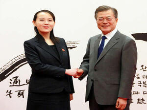 شقيقه كيم مع رئيس كوريا الجنوبية