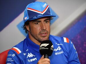 Alpine's Spanish driver Fernando Alonso answers a journalist's question during a press conference on the eve of the start of the Formula One French Grand Prix 2022, on the Circuit Paul Ricard in Le Castellet, southern France, on July 21, 2022. The French Formula 1 Grand Prix will play an important card for its future from July 22 to July 24 on the Castellet circuit, with an unprecedented mobility plan for the 200,000 spectators expected. (Photo by Sylvain THOMAS / AFP)