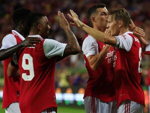 Martin Odegaard of Arsenal celebrates with teammates Gabriel Jesus and Granit Xhaka after scoring their side's second goal during the Florida Cup match between Chelsea and Arsenal at Camping World Stadium on July 23, 2022 in Orlando, Florida. Mike Ehrmann/Getty Images/AFP (Photo by Mike Ehrmann / GETTY IMAGES NORTH AMERICA / Getty Images via AFP)