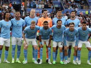 Manchester City's players pose for a picture prior to the English FA Community Shield football match between Liverpool and Manchester City at the King Power Stadium in Leicester on July 30, 2022. (Photo by Nigel Roddis / AFP)