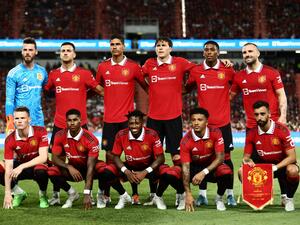 Manchester United's players pose for a team photo before the start of the exhibition football match between English Premier League teams Manchester United and Liverpool FC at Rajamangala National Stadium in Bangkok on July 12, 2022. (Photo by Jack TAYLOR / AFP)