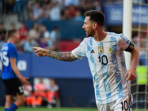 Argentina's forward Lionel Messi celebrates after scoring his team's second goal during the international friendly football match between Argentina and Estonia at El Sadar stadium in Pamplona on June 5, 2022. (Photo by ANDER GILLENEA / AFP)