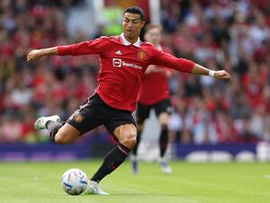 Manchester United's Portuguese striker Cristiano Ronaldo passes the ball during a pre-season club friendly football match between Manchester United and Rayo Vallecano at Old Trafford in Manchester, north west England, on July 31, 2022. (Photo by Nigel Roddis / AFP)