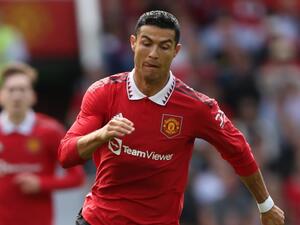 Manchester United's Portuguese striker Cristiano Ronaldo runs with the ball during a pre-season club friendly football match between Manchester United and Rayo Vallecano at Old Trafford in Manchester, north west England, on July 31, 2022. (Photo by Nigel Roddis / AFP)