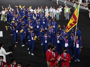Athletes for Team Sri Lanka take part in the opening ceremony for the Commonwealth Games at the Alexander Stadium in Birmingham, central England, on July 28, 2022. (Photo by Glyn KIRK / AFP)