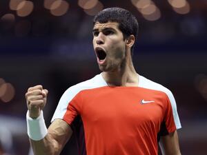 Carlos Alcaraz of Spain celebrates winning a point against Jannik Sinner of Italy during their Men’s Singles Quarterfinal match on Day Ten of the 2022 US Open at USTA Billie Jean King National Tennis Center on September 07, 2022 in the Flushing neighborhood of the Queens borough of New York City. Julian Finney/Getty Images/AFP (Photo by JULIAN FINNEY / GETTY IMAGES NORTH AMERICA / Getty Images via AFP)