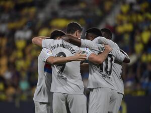 Barcelona's Spanish midfielder Ansu Fati (2nd-R) celebrates with teammates after scoring his team's third goal during the Spanish league football match between Cadiz CF and FC Barcelona at the Nuevo Mirandilla stadium in Cadiz, on September 10, 2022. (Photo by CRISTINA QUICLER / AFP)