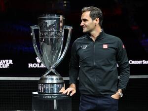 Roger Federer poses for a photograph with the Laver Cup Trophy after taking part in a live TV interview on CNBC at TD Garden on September 24, 2021 in Boston, Massachusetts. Clive Brunskill/Getty Images for Laver Cup/AFP (Photo by CLIVE BRUNSKILL / GETTY IMAGES NORTH AMERICA / Getty Images via AFP)