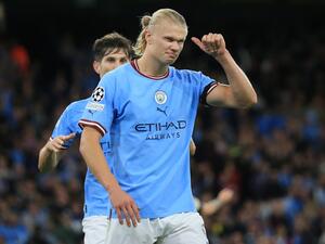 Manchester City's Norwegian striker Erling Haaland celebrates his goal during the UEFA Champions League group G football match between England's Manchester City and Germany's Borussia Dortmund at the Etihad Stadium in Manchester on September 14, 2022. (Photo by Lindsey Parnaby / AFP)