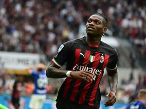 AC Milan's Portuguese forward Rafael Leao celebrates scoring his team's first goal during the Italian Serie A football match between AC Milan and Inter Milan at the San Siro stadium in Milan on September 3, 2022. (Photo by Miguel MEDINA / AFP)