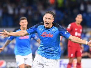 Napoli's Polish midfielder Piotr Zielinski celebrates after scoring a penalty kick during the UEFA Champions League Group A first leg football match between SSC Napoli and Liverpool FC at the Diego Armando Maradona Stadium in Naples on September 7, 2022. (Photo by Alberto PIZZOLI / AFP)