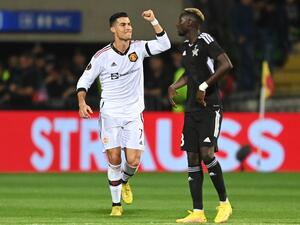 Manchester United's Portuguese striker Cristiano Ronaldo celebrates scoring the 0-2 from the penalty spot during the UEFA Europa League group E football match between Sheriff and Manchester United at Zimbru stadium in Chisinau on September 15, 2022. (Photo by Daniel MIHAILESCU / AFP)