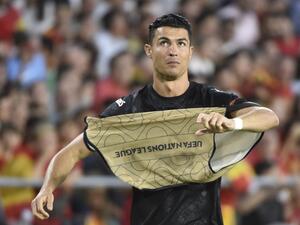 Portugal's forward Cristiano Ronaldo warms up on the sideline during the UEFA Nations League, league A group 2 football match between Spain and Portugal, at the Benito Villamarin stadium in Seville on June 2, 2022. (Photo by CRISTINA QUICLER / AFP)
