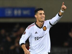Manchester United's Portuguese striker Cristiano Ronaldo celebrates after scoring the 0-2 from the penalty spot during the UEFA Europa League group E football match between Sheriff and Manchester United at Zimbru stadium in Chisinau on September 15, 2022. (Photo by Daniel MIHAILESCU / AFP)