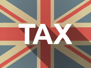 UK Defends Tax-Cutting Budget After Being Urged by IMF to Re-Evaluate Plans