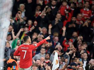 Manchester United's Portuguese striker Cristiano Ronaldo celebrates scoring the team's third goal during the UEFA Europa League Group E football match between Manchester United and Sheriff Tiraspol, at Old Trafford stadium, in Manchester, north-west England, on October 27, 2022. (Photo by Lindsey Parnaby / AFP)