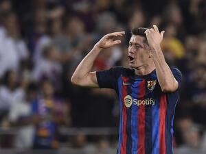 Barcelona's Polish forward Robert Lewandowski celebrates scoring his team's second goal during the Spanish league football match between FC Barcelona and Villarreal CF at the Camp Nou stadium in Barcelona on October 20, 2022. (Photo by Josep LAGO / AFP)