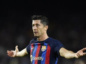 Barcelona's Polish forward Robert Lewandowski reacts during the UEFA Champions League 1st round, group C, football match between FC Barcelona and Inter Milan at the Camp Nou stadium in Barcelona on October 12, 2022. (Photo by Pau BARRENA / AFP)