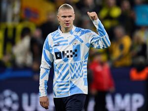 Manchester City's Norwegian striker Erling Haaland reacts after the UEFA Champions League Group G football match between Borussia Dortmund and Manchester City in Dortmund, western Germany on October 25, 2022. The match ended in a 0-0 draw. (Photo by Sascha Schuermann / AFP)