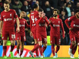 Liverpool's Egyptian striker Mohamed Salah (3R) celebrates scoring his team's sixth goal during the UEFA Champions League Group A football match between Glasgow Rangers and Liverpool at the Ibrox Stadium, in Glasgow, on October 12, 2022. (Photo by ANDY BUCHANAN / AFP)