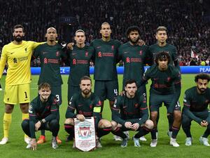 Liverpool players pose for a photograph before the kick-off of the UEFA Champions League group A football match between Ajax Amsterdam and Liverpool at the Johan Cruijff ArenA in Amsterdam, on October 26, 2022. (Photo by JOHN THYS / AFP)