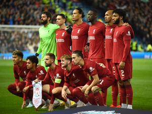 Liverpool players pose for a group picture before the UEFA Champions League Group A football match between Glasgow Rangers and Liverpool at the Ibrox Stadium, in Glasgow, on October 12, 2022. (Photo by ANDY BUCHANAN / AFP)