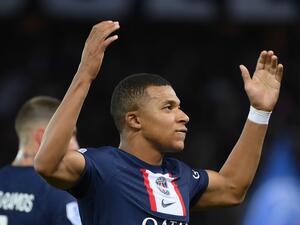 Paris Saint-Germain's French forward Kylian Mbappe celebrates after scoring a goal during the French L1 football match between Paris Saint-Germain (PSG) and OGC Nice at The Parc des Princes Stadium in Paris on October 1, 2022. (Photo by FRANCK FIFE / AFP)